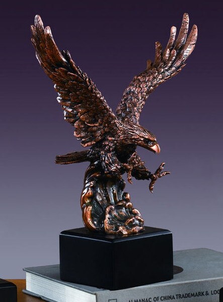 Eagle Soaring over Waves Statue